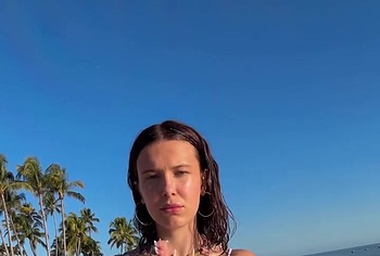 Millie Bobby Brown Flashing Brown Nipples and Bikini Ass Pics