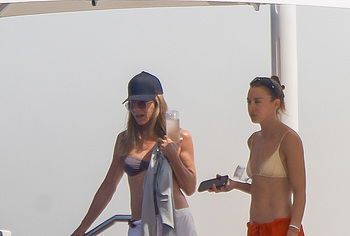 Jennifer Aniston Caught By Paparazzi In Bikini Top On A Yacht