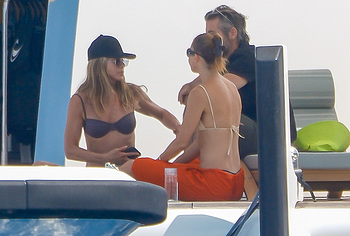Jennifer Aniston Caught By Paparazzi In Bikini Top On A Yacht