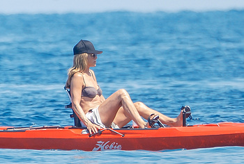 Jennifer Aniston Caught By Paparazzi In Bikini Top On A Yacht