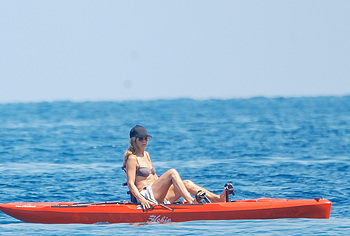 Jennifer Aniston Caught By Paparazzi In Bikini Top On A Yacht