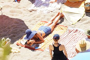 Margot Robbie Caught In Bikini Behind Scenes