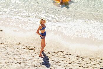 Margot Robbie Caught In Bikini Behind Scenes
