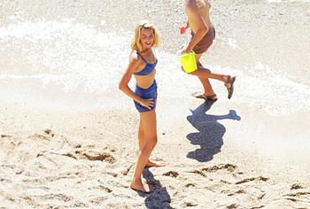 Margot Robbie Caught In Bikini Behind Scenes