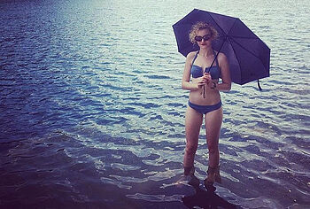Julia Garner Nip Slip And Bikini Photos